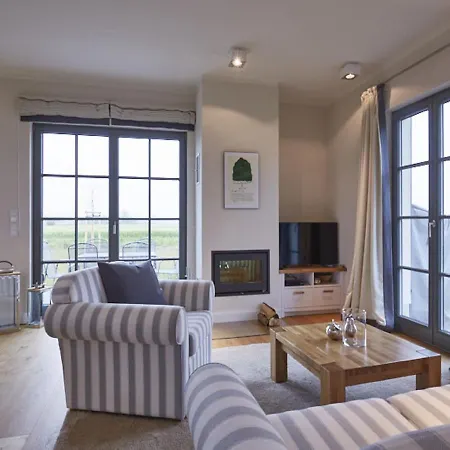 Hébergement de vacances Reetland Am - Premium Reetdachvilla Mit 2 Schlafzimmern, Sauna Und Kamin E22